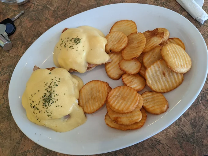 Eggs Benedict with peameal bacon and hollandaise at Sunset Cafe in St. Thomas, ON